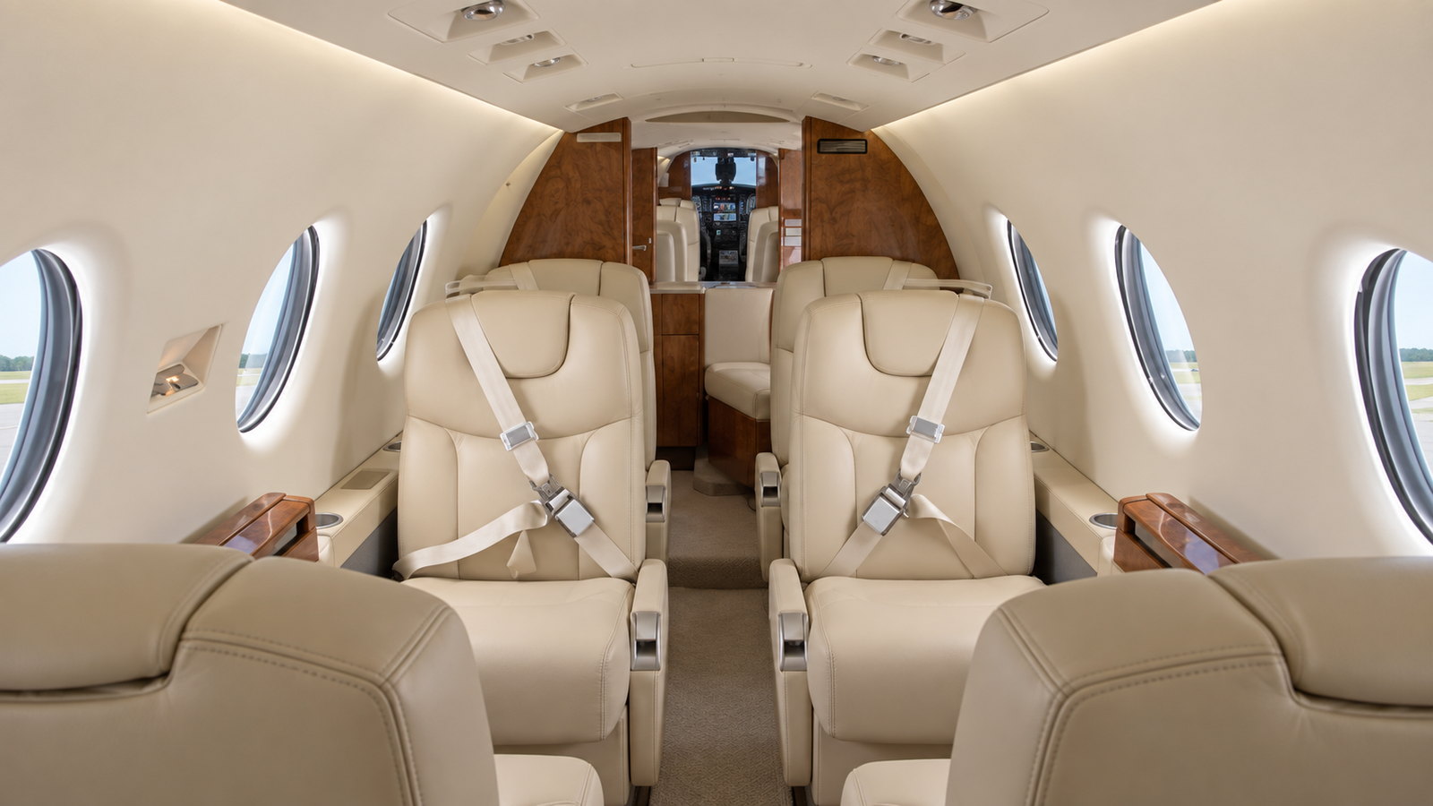 Beechjet 400A cabin looking forward, four club seats in cream leather