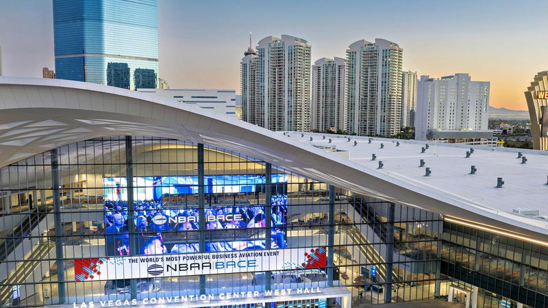 The West Hall of the Las Vegas Convention Center with NBAA-BACE on the screens