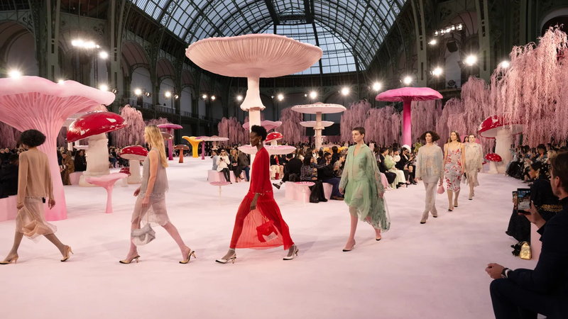 A runway show under the glass roof of the Grand Palais in Paris