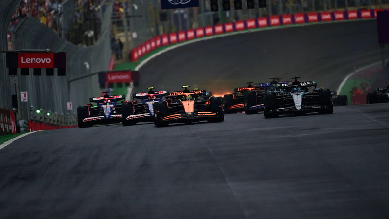 Formula 1 cars climbing the hill at Interlagos in Sao Paulo