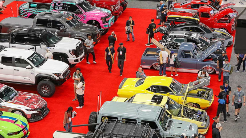 Modified cars and trucks on the red carpet of the SEMA Show floor in Las Vegas