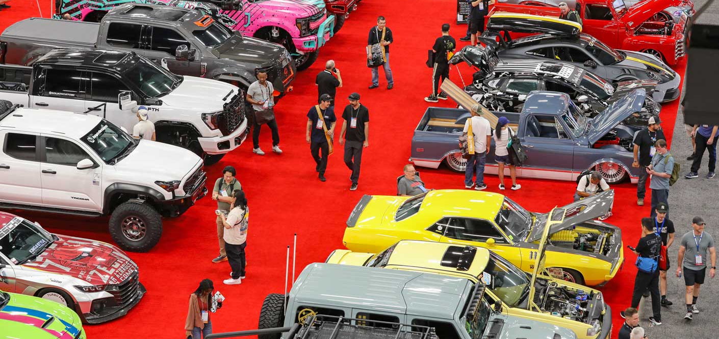 Modified cars and trucks on the red carpet of the SEMA Show floor in Las Vegas