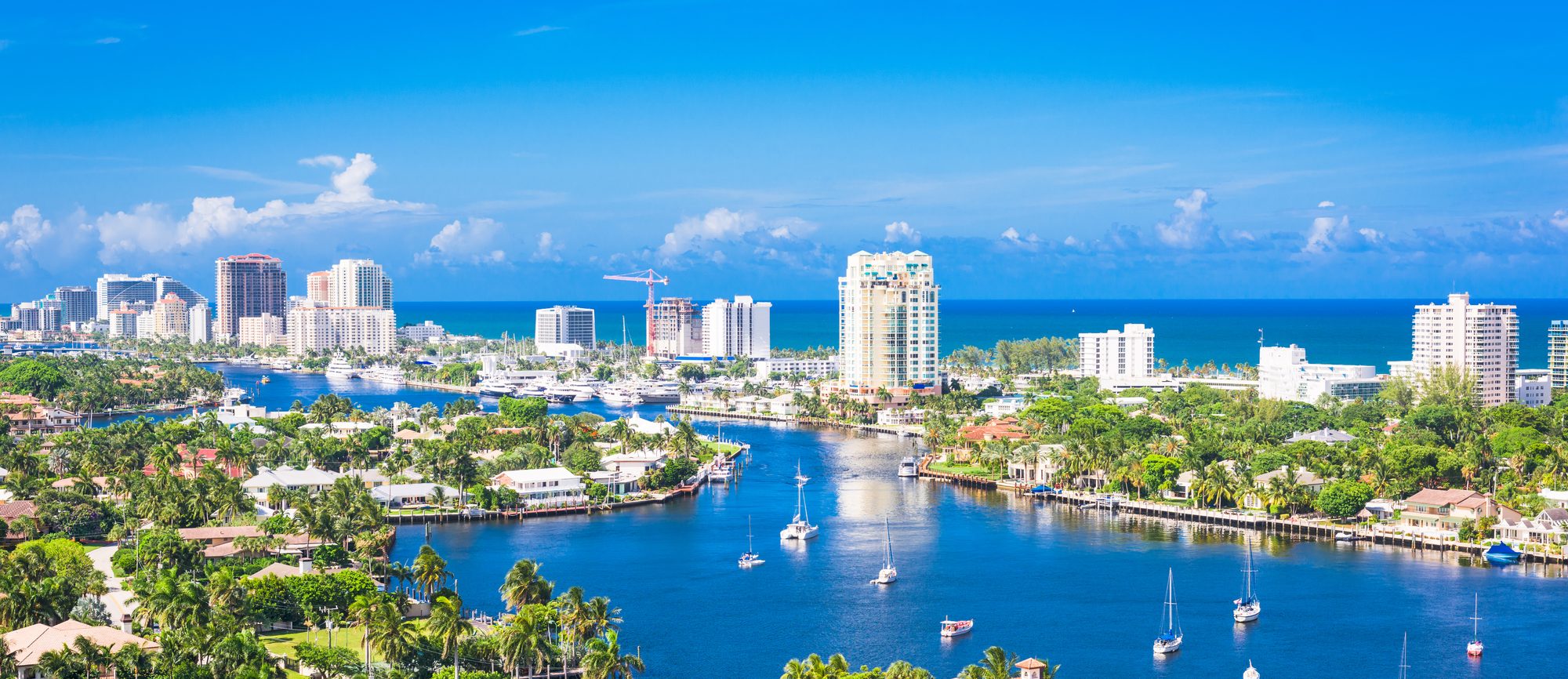 Yachts on the Intracoastal at Fort Lauderdale, the Atlantic behind